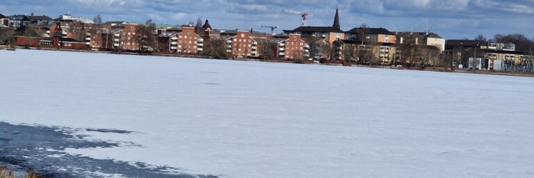 Panoramavy över Viken med Karlstads stadssiluett